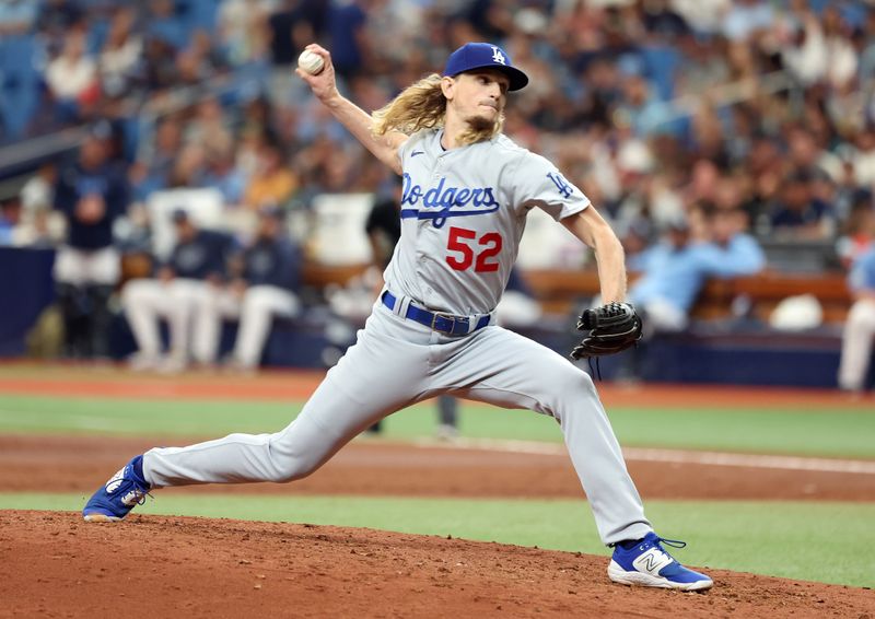 May 28, 2023; St. Petersburg, Florida, USA; Los Angeles Dodgers relief pitcher Phil Bickford (52) throws a pitch against the Tampa Bay Rays during the third inning at Tropicana Field. Mandatory Credit: Kim Klement-USA TODAY Sports