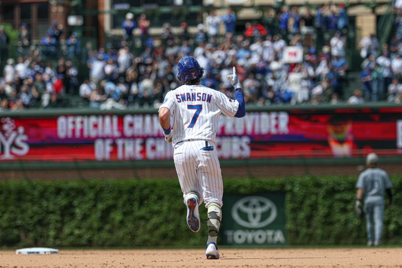 May 17, 2025; Chicago, Illinois, USA; Chicago Cubs shortstop Dansby Swanson (7) round the bases after hitting a solo home run against the Chicago White Sox during the fifth inning at Wrigley Field. Mandatory Credit: Kamil Krzaczynski-Imagn Images