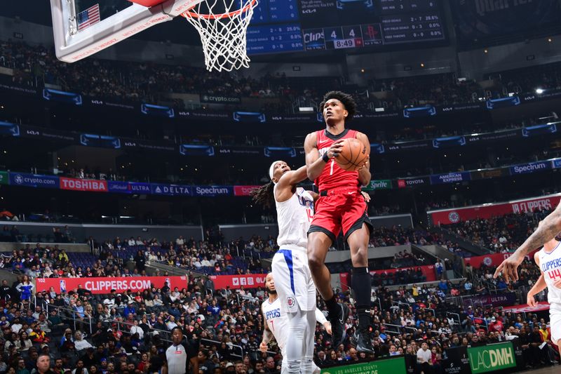 LOS ANGELES, CA - APIRL 14:  Amen Thompson #1 of the Houston Rockets drives to the basket during the game against the LA Clippers on April 14, 2024 at Crypto.Com Arena in Los Angeles, California. NOTE TO USER: User expressly acknowledges and agrees that, by downloading and/or using this Photograph, user is consenting to the terms and conditions of the Getty Images License Agreement. Mandatory Copyright Notice: Copyright 2024 NBAE (Photo by Adam Pantozzi/NBAE via Getty Images)