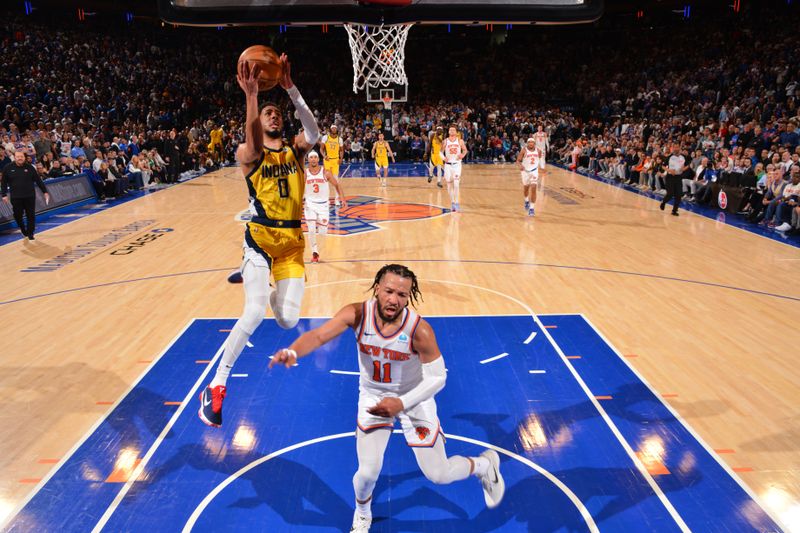 NEW YORK, NY - MAY 19: Tyrese Haliburton #0 of the Indiana Pacers drives to the basket during the game against the New York Knicks during Round 2 Game 7 of the 2024 NBA Playoffs on May 19, 2024 at Madison Square Garden in New York City, New York.  NOTE TO USER: User expressly acknowledges and agrees that, by downloading and or using this photograph, User is consenting to the terms and conditions of the Getty Images License Agreement. Mandatory Copyright Notice: Copyright 2024 NBAE  (Photo by Jesse D. Garrabrant/NBAE via Getty Images)