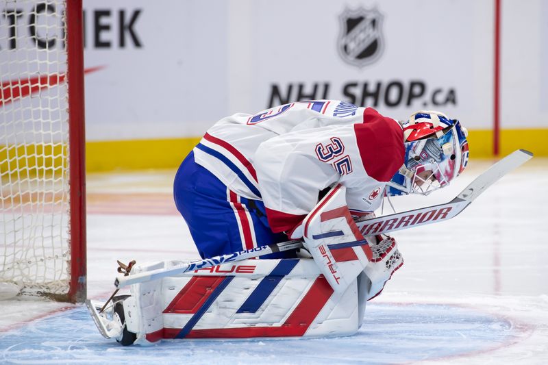 Oct 5, 2024; Ottawa, Ontario, CAN; Montreal Canadiens goalie Sam Montembeault (35) warms up prior to the start of the first period against the Ottawa Senators at the Canadian Tire Centre. Mandatory Credit: Marc DesRosiers-Imagn Images