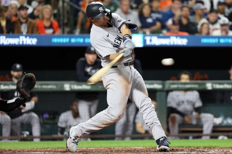 Sep 20, 2025; Baltimore, Maryland, USA; New York Yankees first baseman Paul Goldschmidt (48) hits a single during the eighth inning against the Baltimore Orioles at Oriole Park at Camden Yards. Mandatory Credit: Daniel Kucin Jr.-Imagn Images