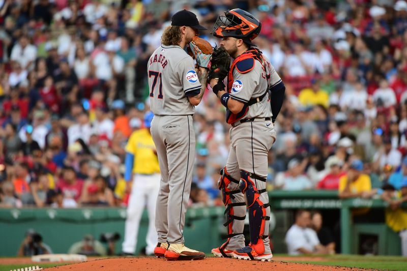 Aug 10, 2024; Boston, Massachusetts, USA;  Houston Astros catcher Victor Caratini (17) talks with relief pitcher Josh Hader (71) during the ninth inning against the Boston Red Sox at Fenway Park. Mandatory Credit: Bob DeChiara-USA TODAY Sports