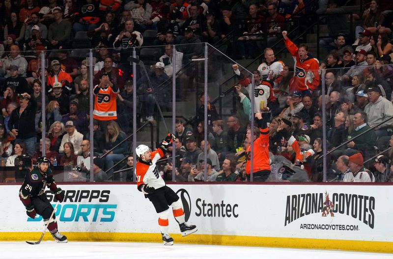 Dec 7, 2023; Tempe, Arizona, USA; Philadelphia Flyers right wing Travis Konecny (11) celebrates his goal against the Arizona Coyotes during the second period at Mullett Arena. Mandatory Credit: Joe Camporeale-USA TODAY Sports