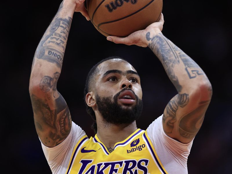 HOUSTON, TEXAS - JANUARY 29: D'Angelo Russell #1 of the Los Angeles Lakers shoots against the Houston Rockets during the first half at Toyota Center on January 29, 2024 in Houston, Texas. NOTE TO USER: User expressly acknowledges and agrees that, by downloading and or using this photograph, User is consenting to the terms and conditions of the Getty Images License Agreement.? (Photo by Carmen Mandato/Getty Images)