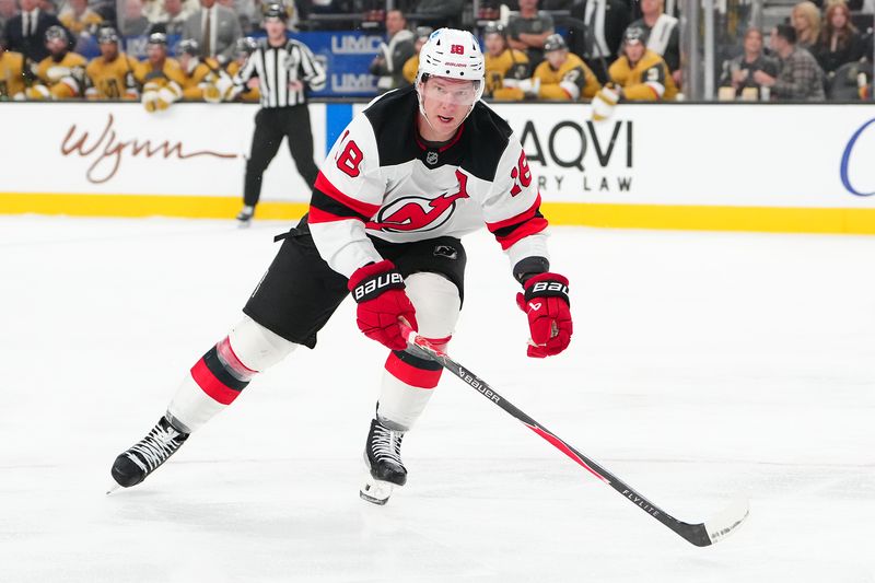 Dec 17, 2025; Las Vegas, Nevada, USA; New Jersey Devils left wing Ondrej Palat (18) skates against the Vegas Golden Knights during the first period at T-Mobile Arena. Mandatory Credit: Stephen R. Sylvanie-Imagn Images