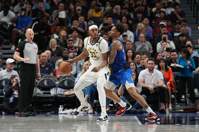 DALLAS, TX - MARCH 5: Myles Turner #33 of the Indiana Pacers dribbles the ball during the game against the Dallas Mavericks on March 5, 2024 at the American Airlines Center in Dallas, Texas. NOTE TO USER: User expressly acknowledges and agrees that, by downloading and or using this photograph, User is consenting to the terms and conditions of the Getty Images License Agreement. Mandatory Copyright Notice: Copyright 2024 NBAE (Photo by Glenn James/NBAE via Getty Images)