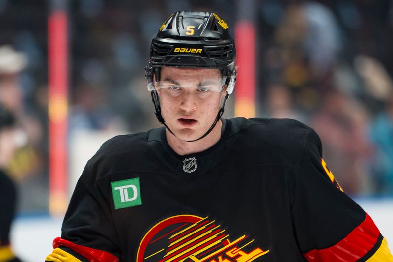 Nov 20, 2025; Vancouver, British Columbia, CAN; Vancouver Canucks defenseman Tom Willander (5) skates during warm up prior to a game against the Dallas Stars at Rogers Arena. Mandatory Credit: Bob Frid-Imagn Images