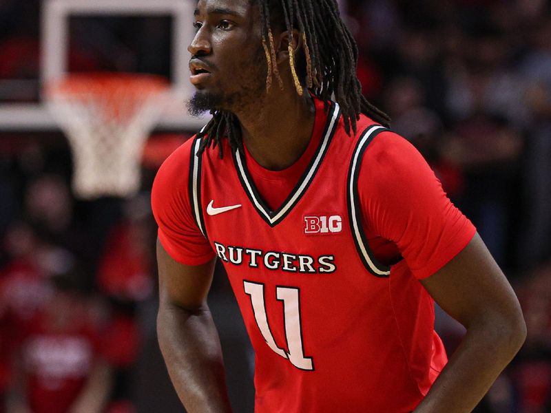 Mar 8, 2026; Piscataway, New Jersey, USA; Rutgers Scarlet Knights forward Christopher Nwuli (11) looks to pass during the first half against the Penn State Nittany Lions at Jersey Mike's Arena. Mandatory Credit: Vincent Carchietta-Imagn Images