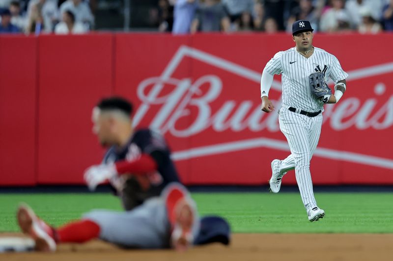 Aug 22, 2023; Bronx, New York, USA; New York Yankees left fielder Everson Pereira (80) runs in after throwing out Washington Nationals second baseman Ildemaro Vargas (14) trying to stretch a single to a double during the fourth inning at Yankee Stadium. Mandatory Credit: Brad Penner-USA TODAY Sports