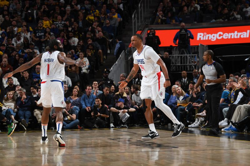 SAN FRANCISCO, CA - FEBRUARY 14: Norman Powell #24 high fives James Harden #1 of the LA Clippers during the game against the Golden State Warriors on FEBRUARY 14, 2024 at Chase Center in San Francisco, California. NOTE TO USER: User expressly acknowledges and agrees that, by downloading and or using this photograph, user is consenting to the terms and conditions of Getty Images License Agreement. Mandatory Copyright Notice: Copyright 2024 NBAE (Photo by Noah Graham/NBAE via Getty Images)