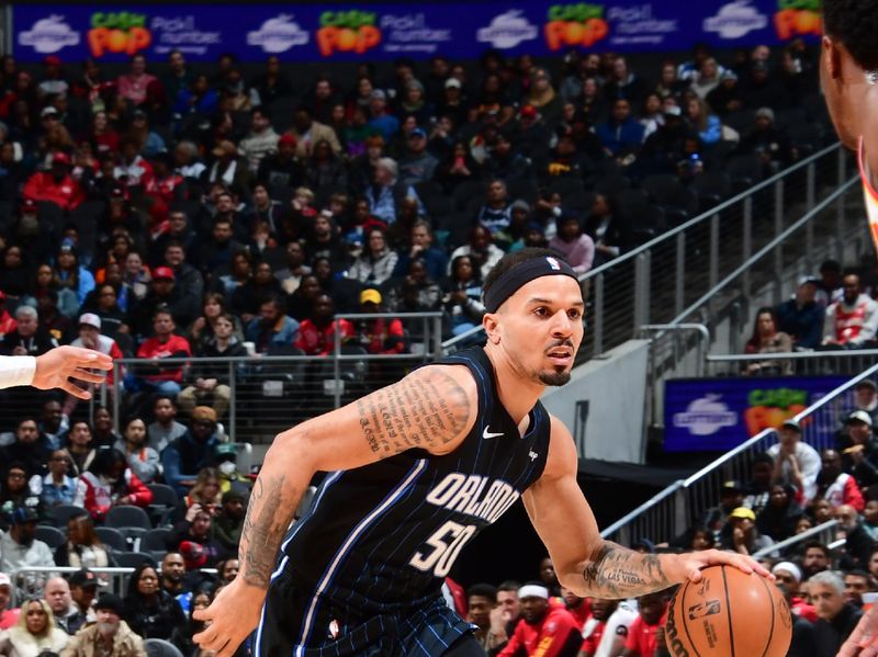 ATLANTA, GA - JANUARY 17: Cole Anthony #50 of the Orlando Magic goes to the basket during the game on January 17, 2024 at State Farm Arena in Atlanta, Georgia.  NOTE TO USER: User expressly acknowledges and agrees that, by downloading and/or using this Photograph, user is consenting to the terms and conditions of the Getty Images License Agreement. Mandatory Copyright Notice: Copyright 2024 NBAE (Photo by Scott Cunningham/NBAE via Getty Images)