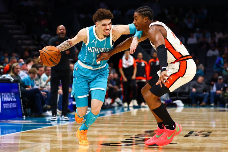 CHARLOTTE, NORTH CAROLINA - NOVEMBER 21: LaMelo Ball #1 of the Charlotte Hornets drives to the basket during the second half of a basketball game against the Detroit Pistons at Spectrum Center on November 21, 2024 in Charlotte, North Carolina. NOTE TO USER: User expressly acknowledges and agrees that, by downloading and or using this photograph, User is consenting to the terms and conditions of the Getty Images License Agreement. (Photo by David Jensen/Getty Images)