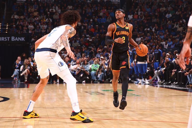 OKLAHOMA CITY, OK - NOVEMBER 17: Shai Gilgeous-Alexander #2 of the Oklahoma City Thunder dribbles the ball during the game against the Dallas Mavericks on November 17, 2024 at Paycom Center in Oklahoma City, Oklahoma. NOTE TO USER: User expressly acknowledges and agrees that, by downloading and or using this photograph, User is consenting to the terms and conditions of the Getty Images License Agreement. Mandatory Copyright Notice: Copyright 2024 NBAE (Photo by Zach Beeker/NBAE via Getty Images)