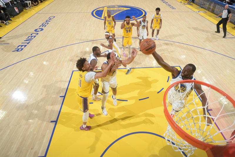 SAN FRANCISCO, CA - OCTOBER 18: Draymond Green #23 of the Golden State Warriors goes up for the rebound during the game against the Los Angeles Lakers during a NBA Preseason game on October 18, 2024 at Chase Center in San Francisco, California. NOTE TO USER: User expressly acknowledges and agrees that, by downloading and or using this photograph, user is consenting to the terms and conditions of Getty Images License Agreement. Mandatory Copyright Notice: Copyright 2024 NBAE (Photo by Noah Graham/NBAE via Getty Images)