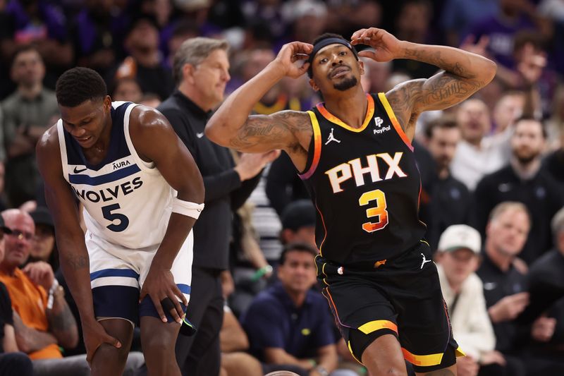 PHOENIX, ARIZONA - APRIL 28: Bradley Beal #3 of the Phoenix Suns reacts after fouling out against Anthony Edwards #5 of the Minnesota Timberwolves during the second half of game four of the Western Conference First Round Playoffs at Footprint Center on April 28, 2024 in Phoenix, Arizona.The Timberwolves defeated the Suns 122-116 and win the series 4-0. NOTE TO USER: User expressly acknowledges and agrees that, by downloading and or using this photograph, User is consenting to the terms and conditions of the Getty Images License Agreement.  (Photo by Christian Petersen/Getty Images)