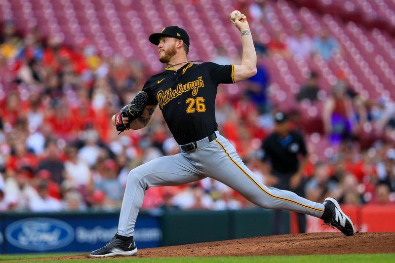 Jun 24, 2024; Cincinnati, Ohio, USA; Pittsburgh Pirates starting pitcher Bailey Falter (26) pitches against the Cincinnati Reds in the first inning at Great American Ball Park. Mandatory Credit: Katie Stratman-USA TODAY Sports