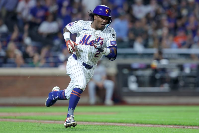 Sep 17, 2024; New York City, New York, USA; New York Mets shortstop Luisangel Acuna (2) runs up the first base line after hitting an RBI double against the Washington Nationals during the third inning at Citi Field. Mandatory Credit: Brad Penner-Imagn Images