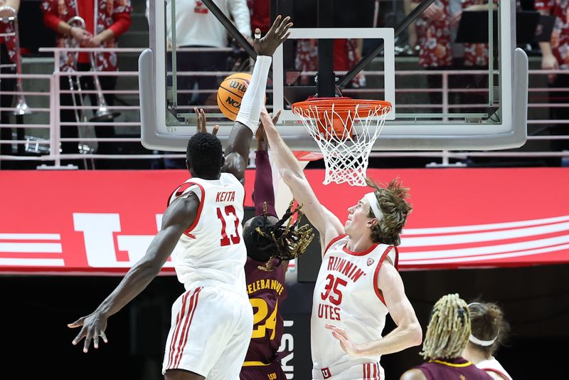 Feb 10, 2024; Salt Lake City, Utah, USA; Utah Utes center Branden Carlson (35) blocks the shot of Arizona State Sun Devils forward Bryant Selebangue (24) during the second half to become the all time Utah Utes shot block leader at Jon M. Huntsman Center. Mandatory Credit: Rob Gray-USA TODAY Sports