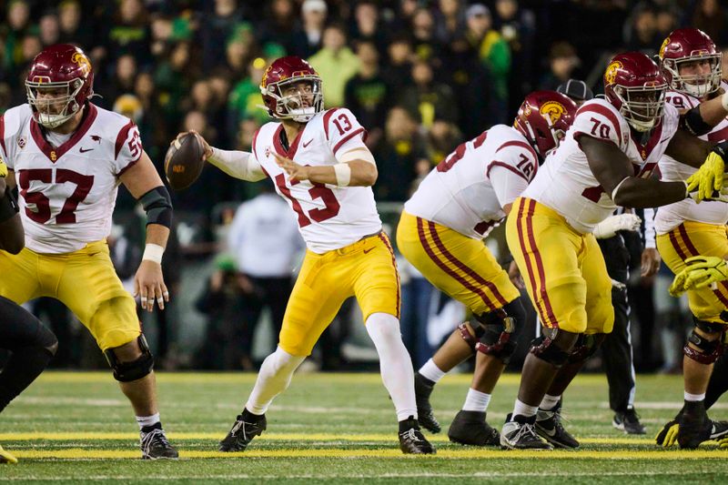 Nov 11, 2023; Eugene, Oregon, USA; USC Trojans quarterback Caleb Williams (13) throws a pass during the second half against the Oregon Ducks at Autzen Stadium. Mandatory Credit: Troy Wayrynen-USA TODAY Sports