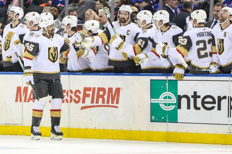 Jan 26, 2024; New York, New York, USA; Vegas Golden Knights right wing Keegan Kolesar (55) celebrates with his teammates after scoring a goal in the second period against the New York Rangers at Madison Square Garden. Mandatory Credit: Wendell Cruz-USA TODAY Sports