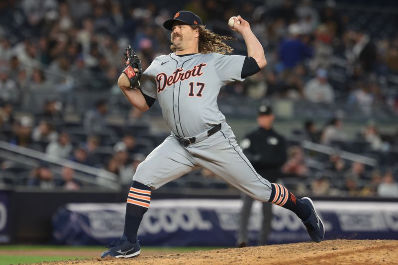 May 3, 2024; Bronx, New York, USA; Detroit Tigers relief pitcher Andrew Chafin (17) delivers a pitch during the seventh inning against the New York Yankees at Yankee Stadium. Mandatory Credit: Vincent Carchietta-USA TODAY Sports