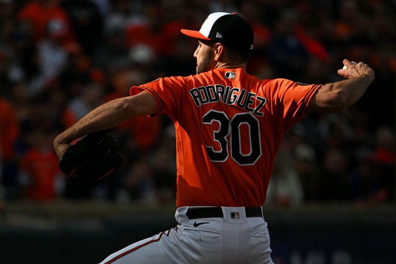 Oct 8, 2023; Baltimore, Maryland, USA; Baltimore Orioles starting pitcher Grayson Rodriguez (30) pitches during the first inning against the Texas Rangers during game two of the ALDS for the 2023 MLB playoffs at Oriole Park at Camden Yards. Mandatory Credit: Tommy Gilligan-USA TODAY Sports