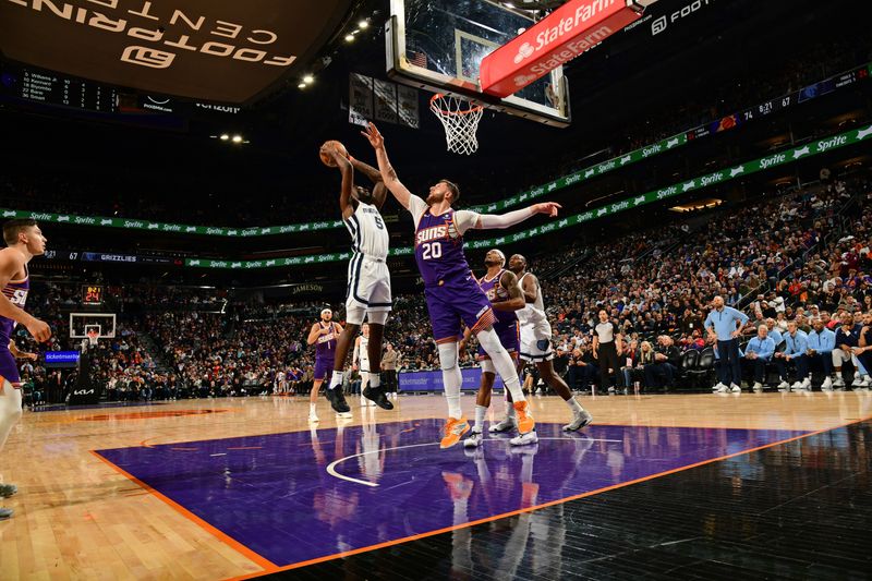 PHOENIX, AZ - JANUARY  7: Vince Williams Jr. #5 of the Memphis Grizzlies shoots the ball during the game against the Phoenix Suns on January 7, 2024 at Footprint Center in Phoenix, Arizona. NOTE TO USER: User expressly acknowledges and agrees that, by downloading and or using this photograph, user is consenting to the terms and conditions of the Getty Images License Agreement. Mandatory Copyright Notice: Copyright 2024 NBAE (Photo by Kate Frese/NBAE via Getty Images)