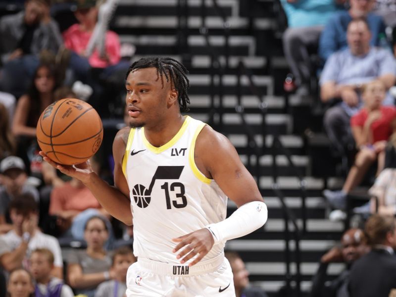 SALT LAKE CITY, UT - OCTOBER 7: Isaiah Collier #13 of the Utah Jazz dribbles the ball during the game against the Houston Rockets during a NBA preseason game on October 7, 2024 at the Delta Center in Salt Lake City, Utah. NOTE TO USER: User expressly acknowledges and agrees that, by downloading and or using this Photograph, User is consenting to the terms and conditions of the Getty Images License Agreement. Mandatory Copyright Notice: Copyright 2024 NBAE (Photo by Melissa Majchrzak/NBAE via Getty Images)