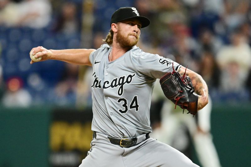 Apr 9, 2024; Cleveland, Ohio, USA; Chicago White Sox pitcher Michael Kopech (34) throws a pitch during the ninth inning against the Cleveland Guardians at Progressive Field. Mandatory Credit: Ken Blaze-USA TODAY Sports