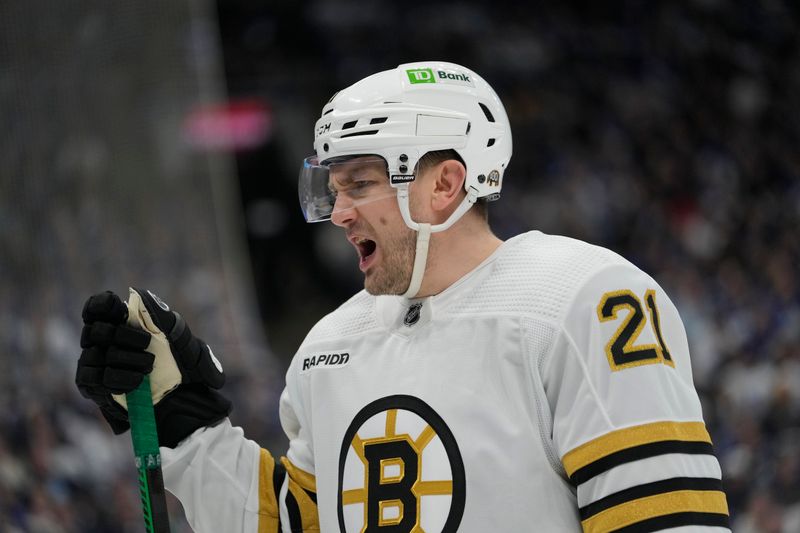 Apr 24, 2024; Toronto, Ontario, CAN; Boston Bruins forward James van Riemsdyk (21) reacts after a play against the Toronto Maple Leafs during the first period of game three of the first round of the 2024 Stanley Cup Playoffs at Scotiabank Arena. Mandatory Credit: John E. Sokolowski-USA TODAY Sports