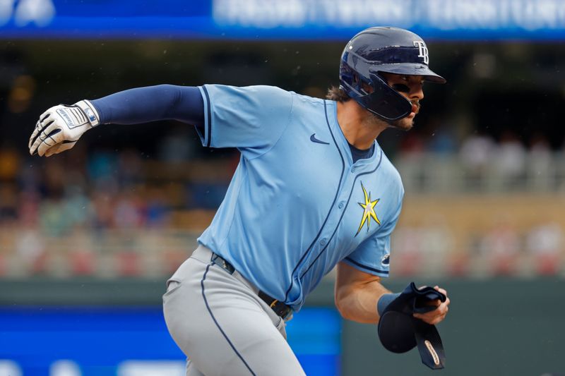 Jun 20, 2024; Minneapolis, Minnesota, USA; Tampa Bay Rays right fielder Joshua Lowe (15) scores against the Minnesota Twins in the second inning at Target Field. Mandatory Credit: Bruce Kluckhohn-USA TODAY Sports