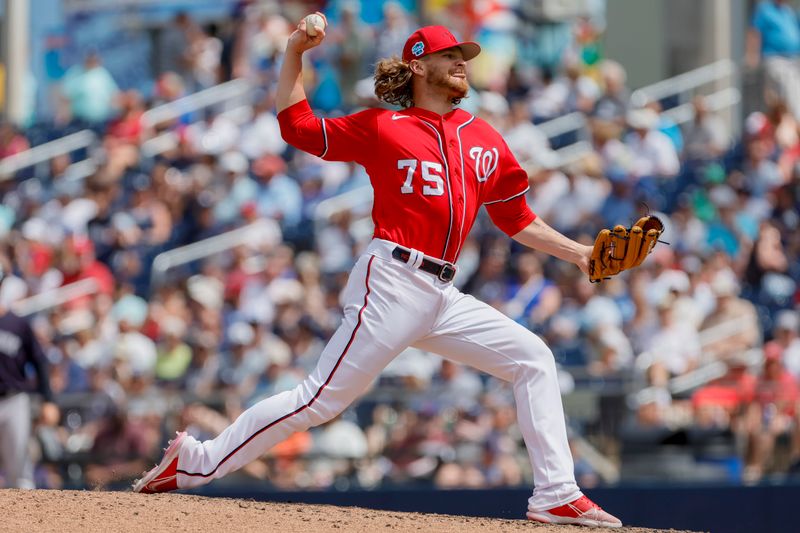 Mar 22, 2023; West Palm Beach, Florida, USA; Washington Nationals relief pitcher Hobie Harris (75) delivers a pitch during the seventh inning against the New York Yankees at The Ballpark of the Palm Beaches. Mandatory Credit: Sam Navarro-USA TODAY Sports