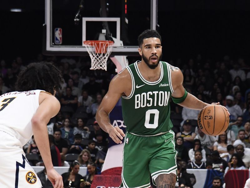 ABU DHABI, UAE - OCTOBER 6: Jayson Tatum #0 of the Boston Celtics dribbles the ball during the game against the Denver Nuggets during the 2024 Global Games on October 6, 2024 at the Etihad Arena in Abu Dhabi, United Arab Emirates. NOTE TO USER: User expressly acknowledges and agrees that, by downloading and/or using this Photograph, user is consenting to the terms and conditions of the Getty Images License Agreement. Mandatory Copyright Notice: Copyright 2024 NBAE (Photo by Brian Babineau/NBAE via Getty Images)