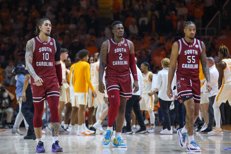 Jan 30, 2024; Knoxville, Tennessee, USA; South Carolina Gamecocks guard Myles Stute (10) and forward B.J. Mack (2) and guard Ta'Lon Cooper (55) during the second half against the Tennessee Volunteers at Thompson-Boling Arena at Food City Center. Mandatory Credit: Randy Sartin-USA TODAY Sports