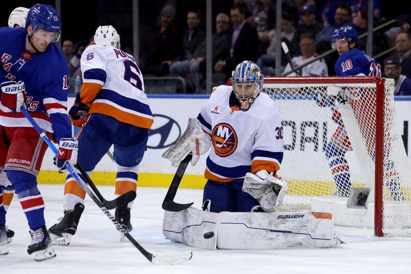 Mar 3, 2025; New York, New York, USA; New York Islanders goaltender Ilya Sorokin (30) makes a save against the New York Rangers during the third period at Madison Square Garden. Mandatory Credit: Brad Penner-Imagn Images
