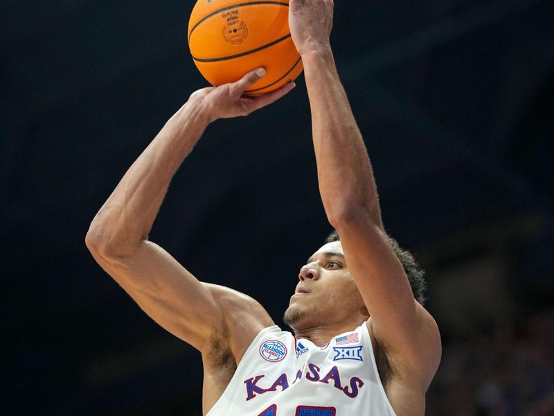  Nov 6, 2023; Lawrence, Kansas, USA; Kansas Jayhawks guard Kevin McCullar Jr. (15) shoots during the first half against the North Carolina Central Eagles at Allen Fieldhouse. Mandatory Credit: Jay Biggerstaff-USA TODAY Sports