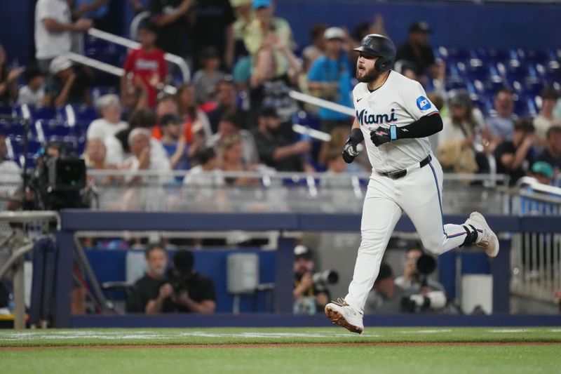 Aug 7, 2024; Miami, Florida, USA;  Miami Marlins pitcher Valente Bellozo (83) pitches against the Cincinnati Reds in the first inning at loanDepot Park. Mandatory Credit: Jim Rassol-USA TODAY Sports