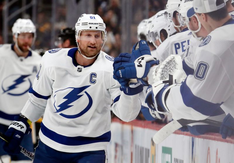 Apr 6, 2024; Pittsburgh, Pennsylvania, USA;  Tampa Bay Lightning center Steven Stamkos (91) celebrates his goal with the Lightning bench against the Pittsburgh Penguins during the third period at PPG Paints Arena. The Penguins won 5-4. Mandatory Credit: Charles LeClaire-USA TODAY Sports