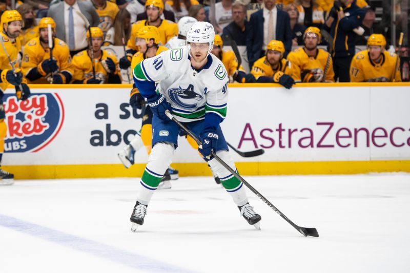 Apr 28, 2024; Nashville, Tennessee, USA; Vancouver Canucks center Elias Pettersson (40) skates against the Nashville Predators during the first period in game four of the first round of the 2024 Stanley Cup Playoffs at Bridgestone Arena. Mandatory Credit: Steve Roberts-USA TODAY Sports