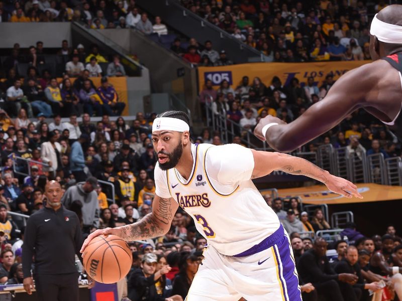 LOS ANGELES, CA - JANUARY 21:  Anthony Davis #3 of the Los Angeles Lakers goes to the basket during the game on January 21, 2024 at Crypto.Com Arena in Los Angeles, California. NOTE TO USER: User expressly acknowledges and agrees that, by downloading and/or using this Photograph, user is consenting to the terms and conditions of the Getty Images License Agreement. Mandatory Copyright Notice: Copyright 2024 NBAE (Photo by Juan Ocampo/NBAE via Getty Images)