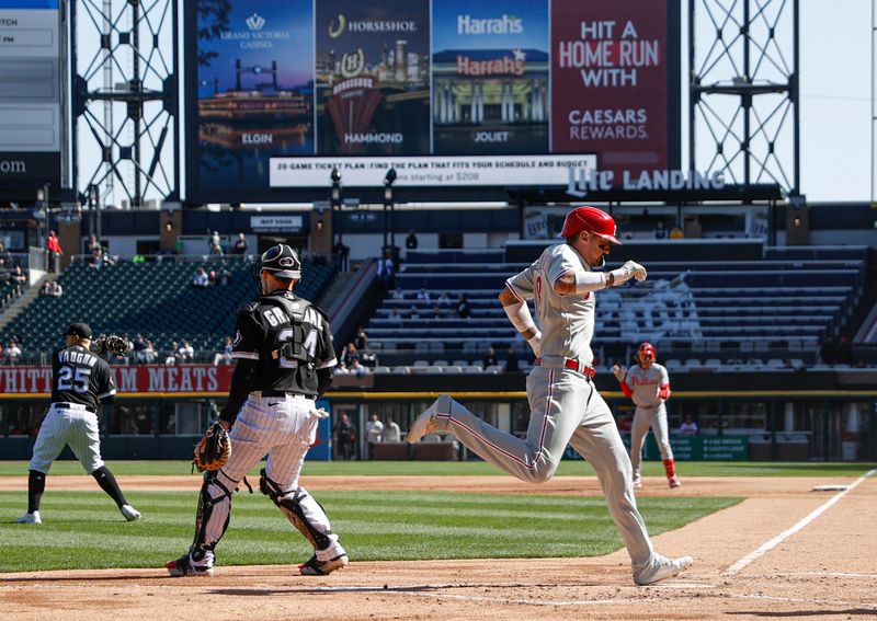 Apr 18, 2023; Chicago, Illinois, USA; Philadelphia Phillies right fielder Nick Castellanos (8) scores against the Chicago White Sox during the first inning of game one of the doubleheader at Guaranteed Rate Field. Mandatory Credit: Kamil Krzaczynski-USA TODAY Sports