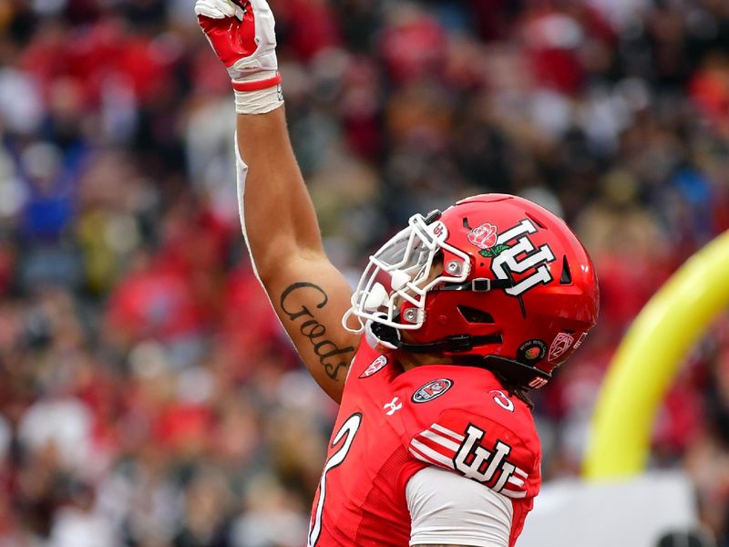 Jan 2, 2023; Pasadena, California, USA; Utah Utes running back Ja'Quinden Jackson (3) celebrates after scoring a touchdown in the second quarter against the Penn State Nittany Lions  in the 109th Rose Bowl game at the Rose Bowl. Mandatory Credit: Gary A. Vasquez-USA TODAY Sports