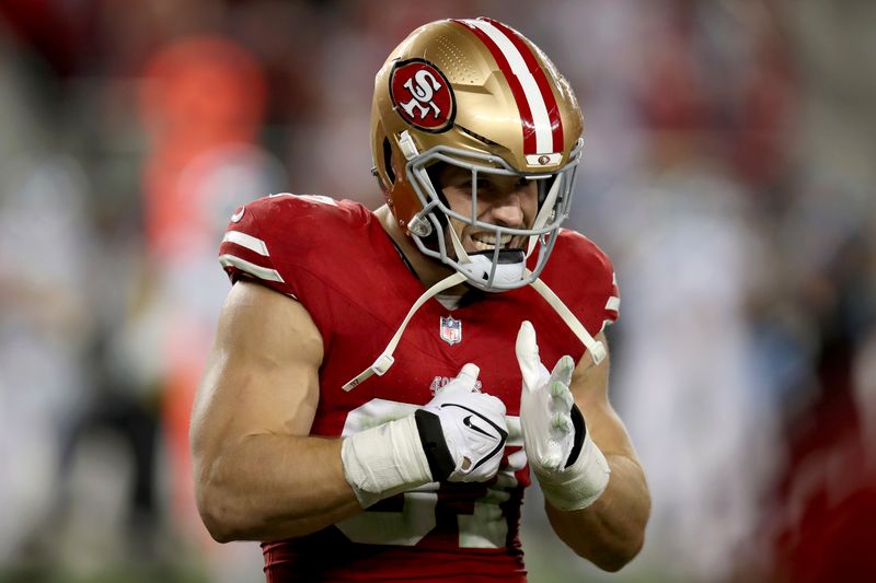 San Francisco 49ers defensive end Nick Bosa (97) reacts after a turnover during the NFC Championship NFL football game against the Detroit Lions in Santa Clara, Calif., Sunday, Jan. 28, 2024. (AP Photo/Scot Tucker)