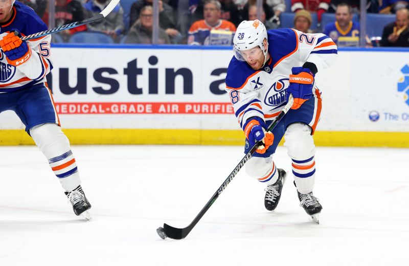 Mar 10, 2025; Buffalo, New York, USA;  Edmonton Oilers right wing Connor Brown (28) takes a shot on goal during the first period against the Buffalo Sabres at KeyBank Center. Mandatory Credit: Timothy T. Ludwig-Imagn Images