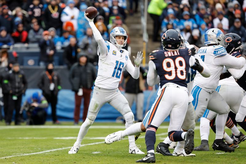 Detroit Lions quarterback Jared Goff (16) passes the ball during the second half of an NFL football game against the Chicago Bears, Sunday, Dec. 10, 2023, in Chicago. (AP Photo/Kamil Krzaczynski)