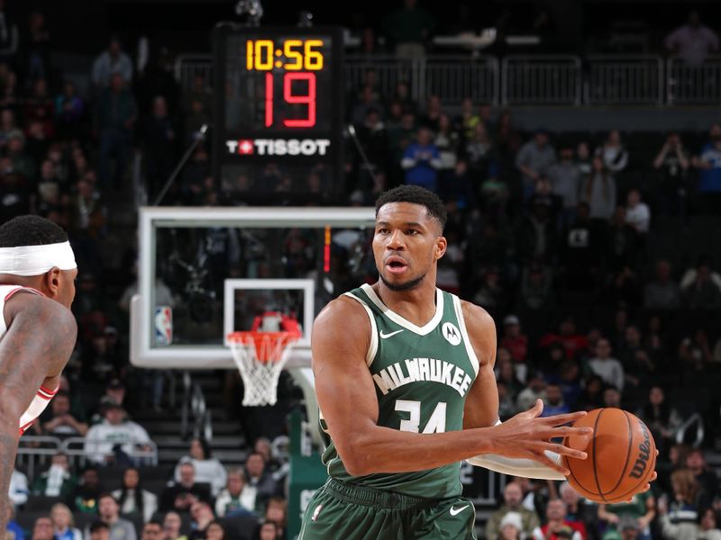 MILWAUKEE, WI - NOVEMBER 20: Giannis Antetokounmpo #34 of the Milwaukee Bucks looks to pass the ball during the game against the Chicago Bulls on November 20, 2024 at the Fiserv Forum Center in Milwaukee, Wisconsin. NOTE TO USER: User expressly acknowledges and agrees that, by downloading and or using this Photograph, user is consenting to the terms and conditions of the Getty Images License Agreement. Mandatory Copyright Notice: Copyright 2024 NBAE (Photo by Gary Dineen/NBAE via Getty Images).