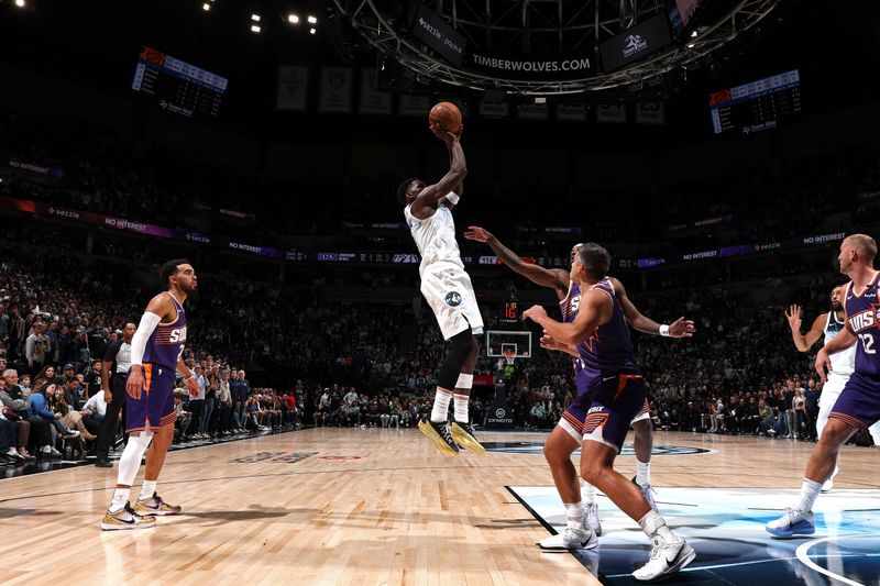 MINNEAPOLIS, MN - NOVEMBER 17: Anthony Edwards #5 of the Minnesota Timberwolves shoots the ball during the game against the Phoenix Suns on November 17, 2024 at Target Center in Minneapolis, Minnesota. NOTE TO USER: User expressly acknowledges and agrees that, by downloading and or using this Photograph, user is consenting to the terms and conditions of the Getty Images License Agreement. Mandatory Copyright Notice: Copyright 2024 NBAE(Photo by David Sherman/NBAE via Getty Images)