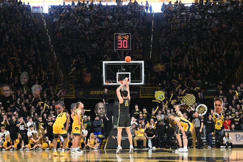 Jan 20, 2024; Iowa City, Iowa, USA; Iowa Hawkeyes fans react to Purdue Boilermakers center Zach Edey (15) as he shoots a free throw during the second half at Carver-Hawkeye Arena. Mandatory Credit: Jeffrey Becker-USA TODAY Sports