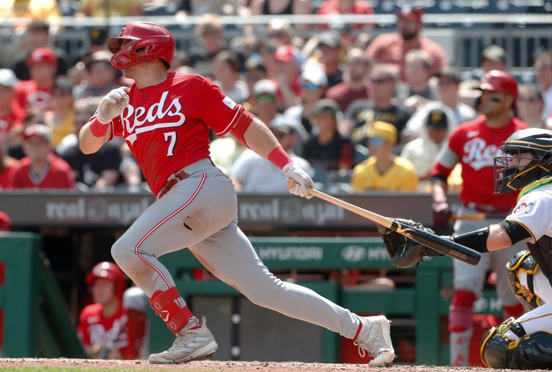 Aug 13, 2023; Pittsburgh, Pennsylvania, USA; Cincinnati Reds third baseman Spencer Steer (7) hits a single against the Pittsburgh Pirates during the sixth inning at PNC Park. Mandatory Credit: Charles LeClaire-USA TODAY Sports